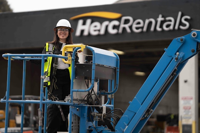 67b647f60de0f2119965bfe5 Herc Rentals Nov 23 Sign Woman In Basket Of Awp