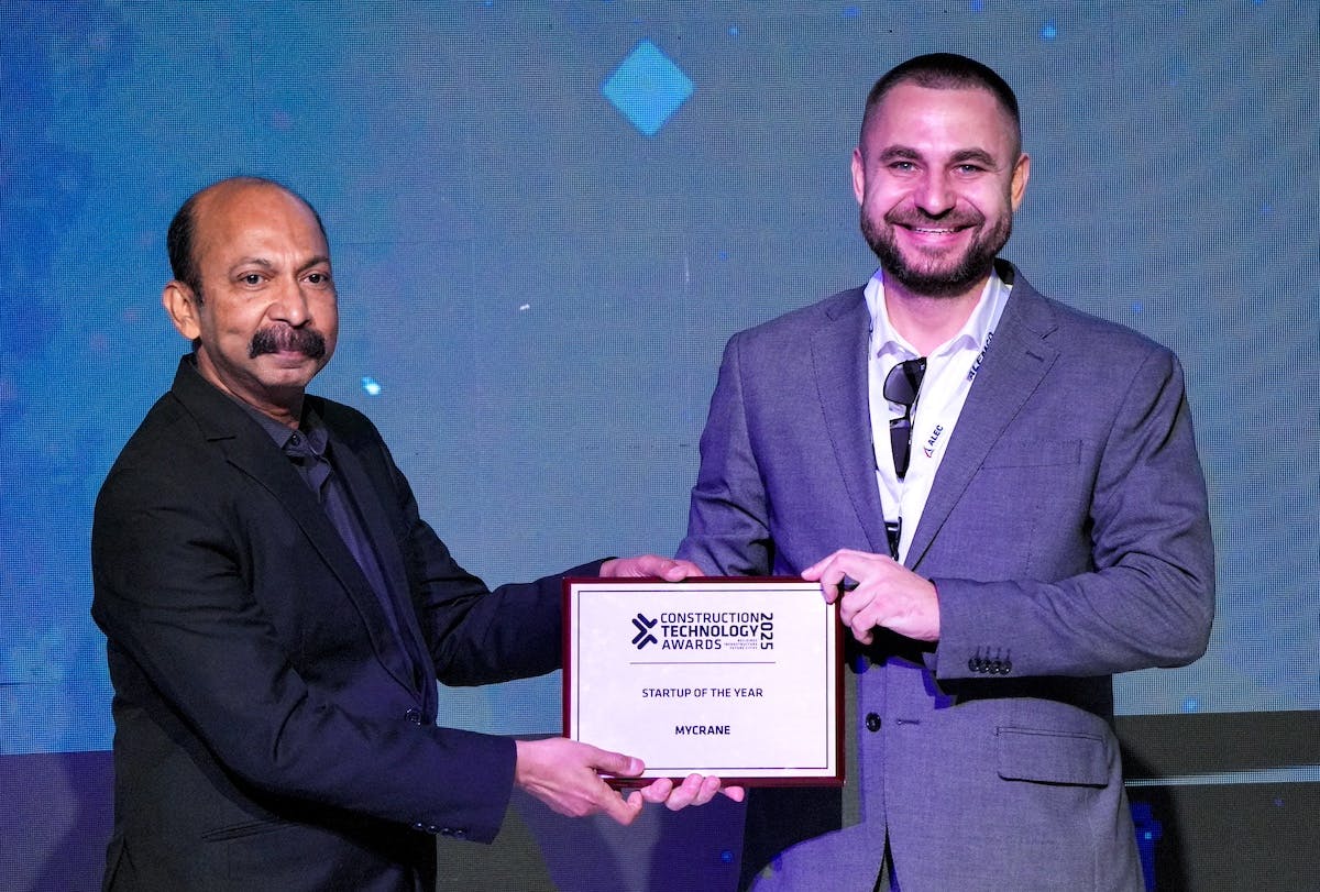 681bd1d1e8d5676edb18813f Mycrane Founder Andrei Geikalo Right Receives The