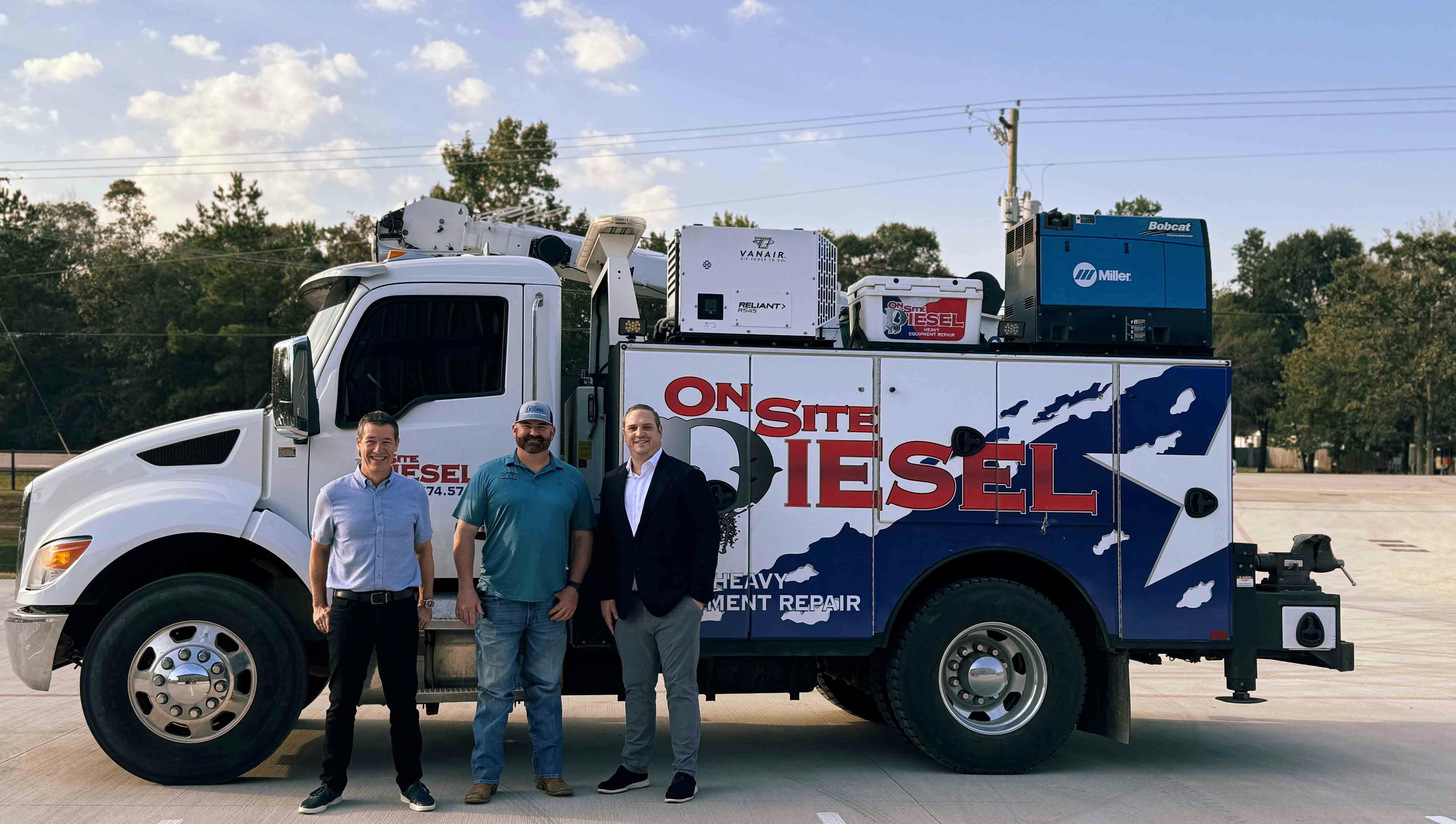 From left: Christian Vorspel-Rueter, executive VP & CFO, Deutz Corp.; Brent Nestor, president, OnSite Diesel and Spencer McHugh, Deutz Americas head of M&A, strategy, and field service growth, celebrate the acquisition by an OnSite Diesel service truck.