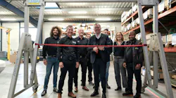Pierre-Frederic Billet, mayor of Dreux, France, cuts the ribbon to open LGH’s new facility.