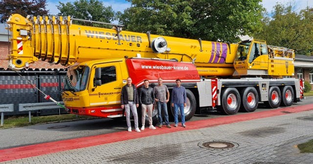 Weisbauer dudes dwarfed by the massive Grove crane. From left: Lukas Brdmer, Sacha Weitzel, Jorg Haasner and Jan Schoneck.