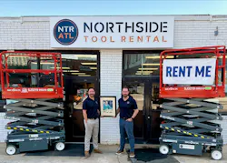 Cooper Douville, left, and Josh Nickell, hold up a photo of Northside Tool Rental founder Roy Milling. Cooper Douville, left, and Josh Nickell, hold up a photo of Northside Tool Rental founder Roy Milling.