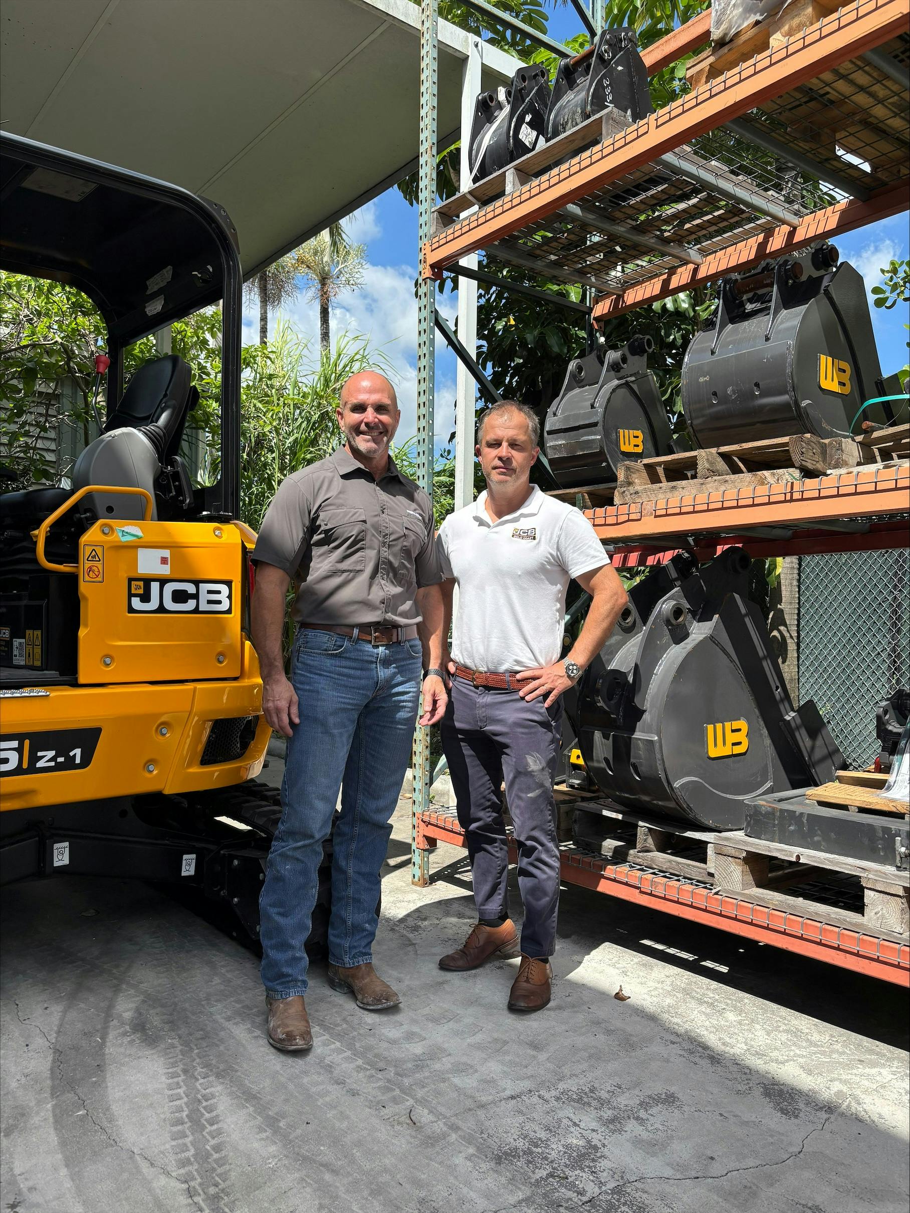 Todd Kundinger, Werk-Brau southeast regional manager, left, and Gold Coast JCB sales manager Toby Allen.