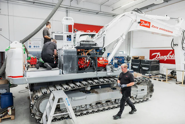 Danfoss excavator conversion. The excavator&rsquo;s four primary services &mdash; boom, arm, bucket, and swing &mdash; are supplied through ten individually controllable outlets on the pump.