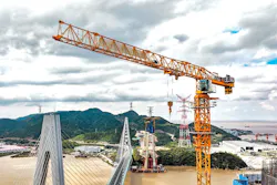 A Potain topless tower crane stands tall over the construction of China’s Zhoushan Taoyaomen Bridge. A Potain topless tower crane stands tall over the construction of China’s Zhoushan Taoyaomen Bridge.