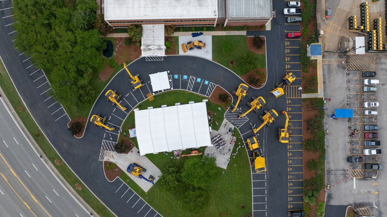 An aerial view of Komatsu excavators parked outside of the Chatanooga Manufacturing Operation