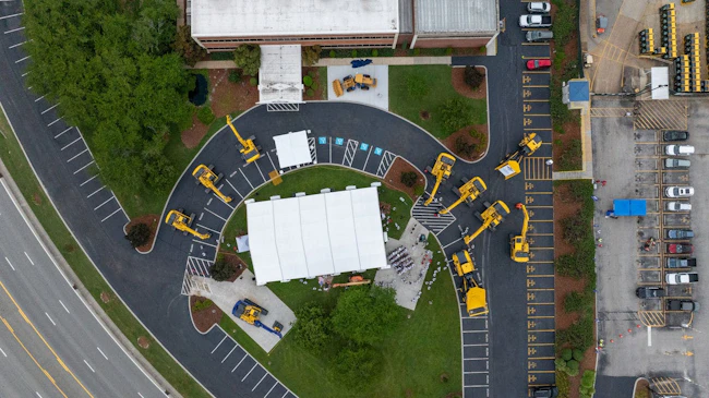 An aerial view of Komatsu excavators parked outside of the Chatanooga Manufacturing Operation