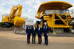From left: Peter Kenyon, Board Adviser, Atlassian Williams F1 Team; Matthew Savage, Chairman, Atlassian Williams F1 Team; Takuya Imayoshi, President and CEO, Komatsu Ltd.; and Yasuji Nishiura, Senior Executive Officer, Komatsu Ltd., at the partnership extension signing ceremony Sept. 2 in Komatsu City, Japan.