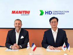 Manitou's Sylvain Blaise and HD Construction Equipment's Jaeyoung Moon at the signing of the agreement.