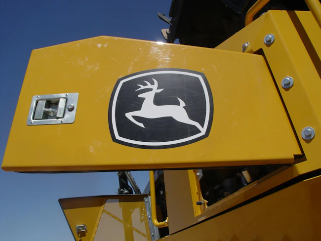6ac6e3b2f00f9bb6609abdb7 Deere Logo On Machine